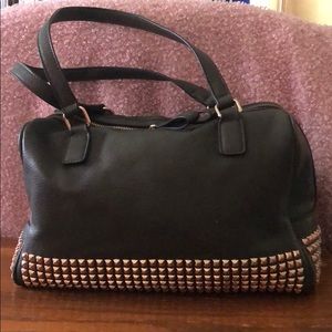 Green studded purse